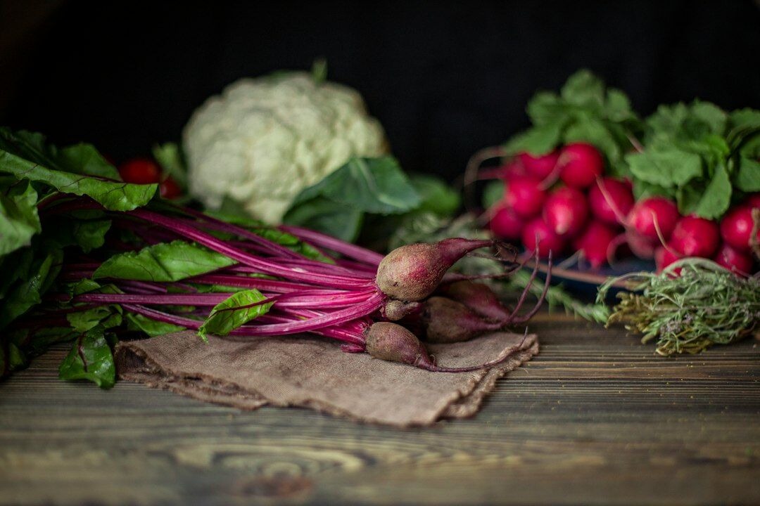 fresh seasonal vegetables on wooden table