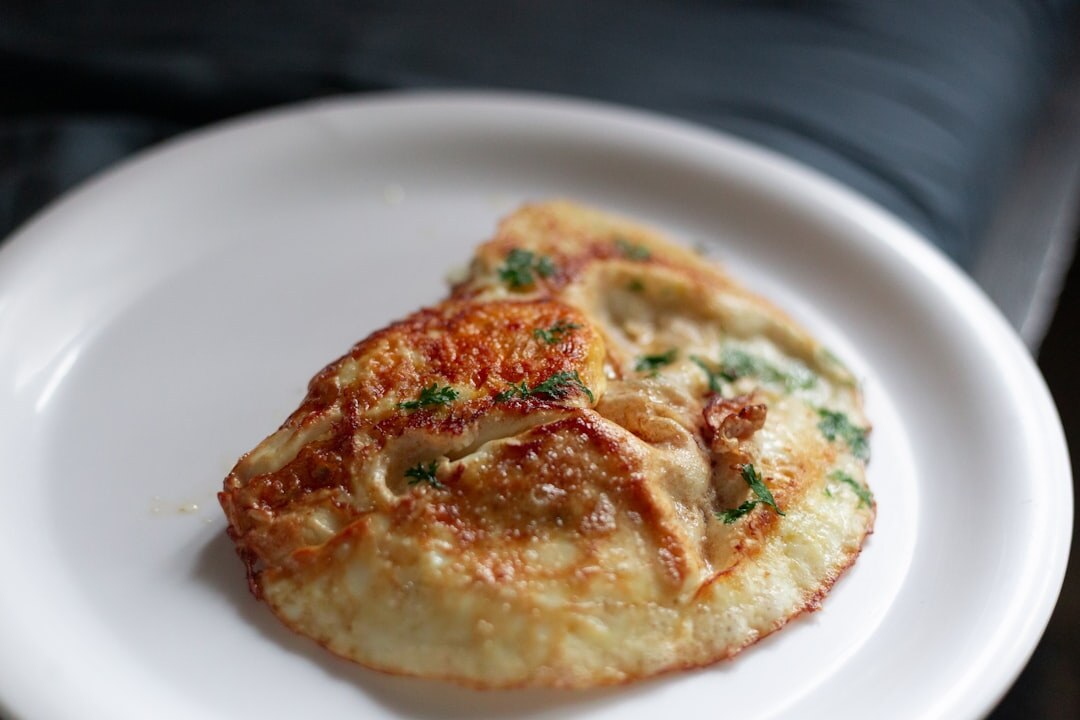 Golden Czech bramborák potato pancake on a wooden board