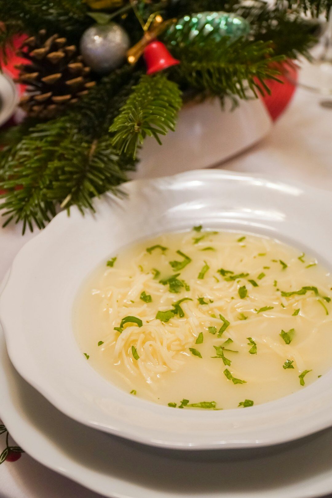 Bowl of creamy Czech kulajda soup with egg and dill
