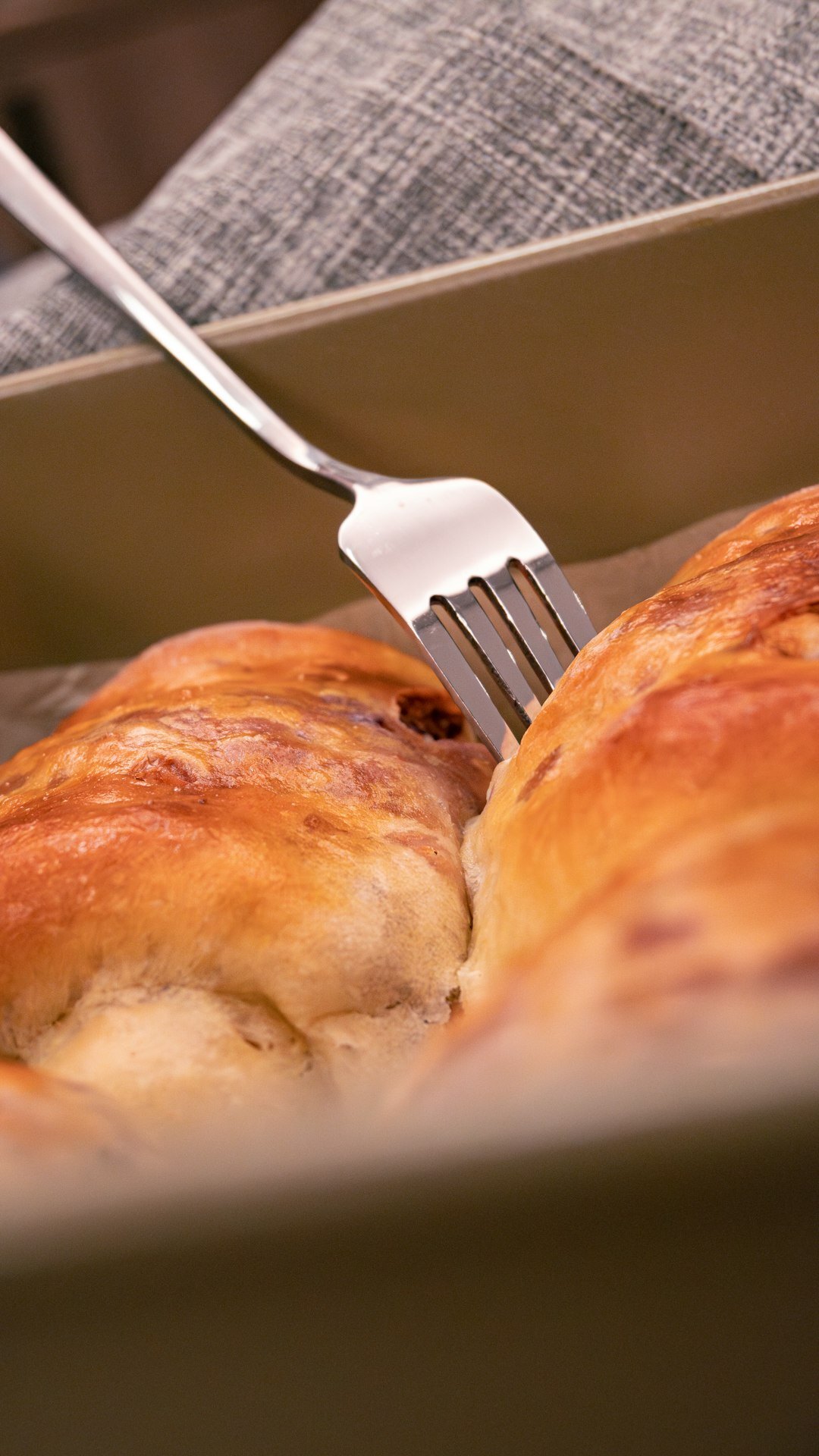 Fresh baked Czech buchty sweet buns dusted with powdered sugar