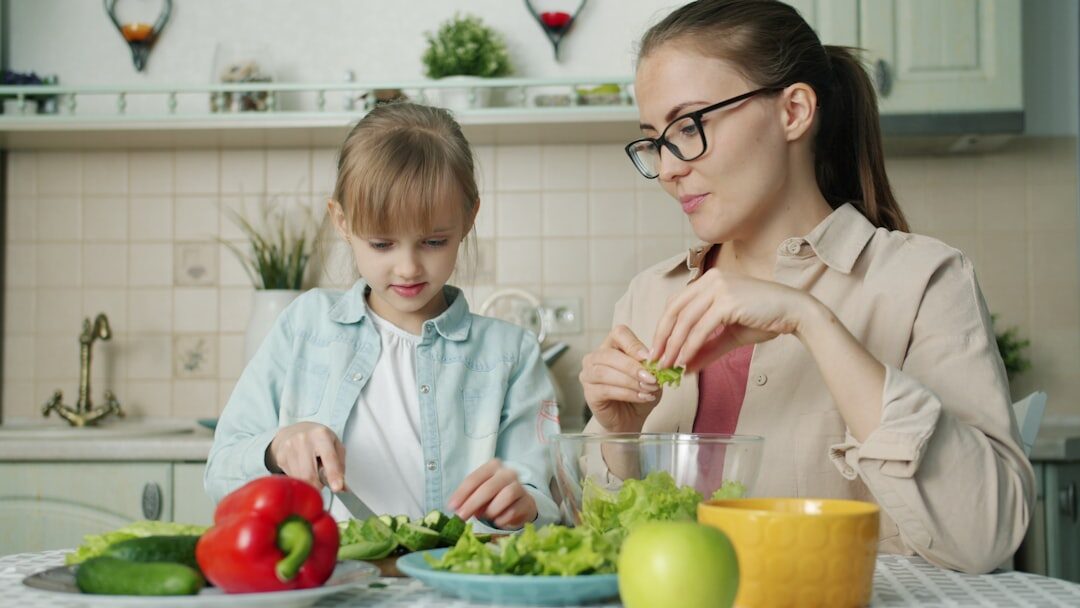 family cooking together in kitchen