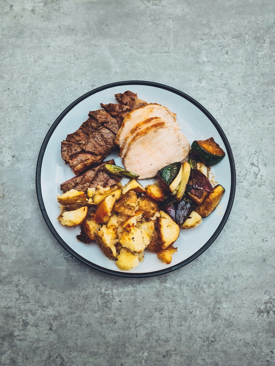 Simple home-cooked weekday lunch plate with meat and potatoes